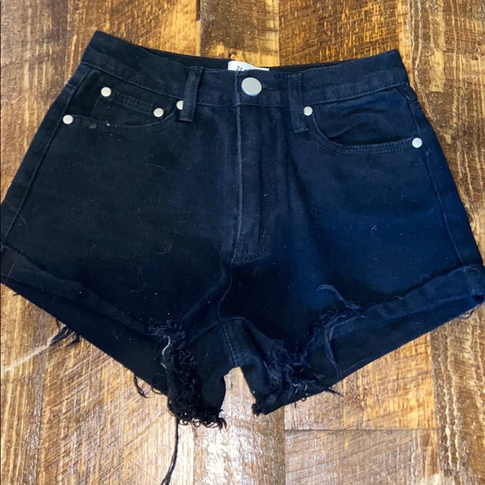 Princess Polly Black Distressed shorts
